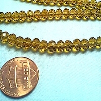 Glass Beads 4mm Crystal Amber BD406 close up view