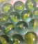 Picture of M82 16MM Green & yellow cat eye glass marbles 