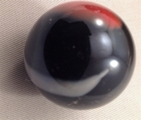 Picture of M214  1-in. Black Base With Orange and White Swirls Glass Marbles