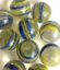 Picture of MJ3222B  HANDMADE 25MM Set of 10 Marbles, CLEAR w/BLUE & YELLOW STRIPES