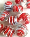 Picture of MM3048A HANDMADE 16MM set of 10, Clear with red and light blue swirls