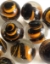 Picture of MM3048H HANDMADE 16MM Clear w/black and orange swirls, set of 10